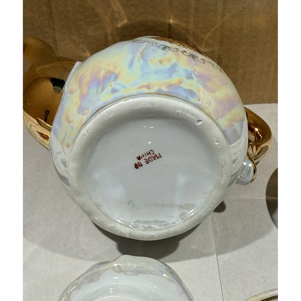 Romeo And Juliet Tea Pot 4 Tea Cups 4 Saucers Gold Trim Handles Iridescent White